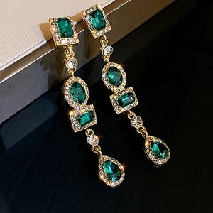 Dangling Earrings with Green Crystals in Gold