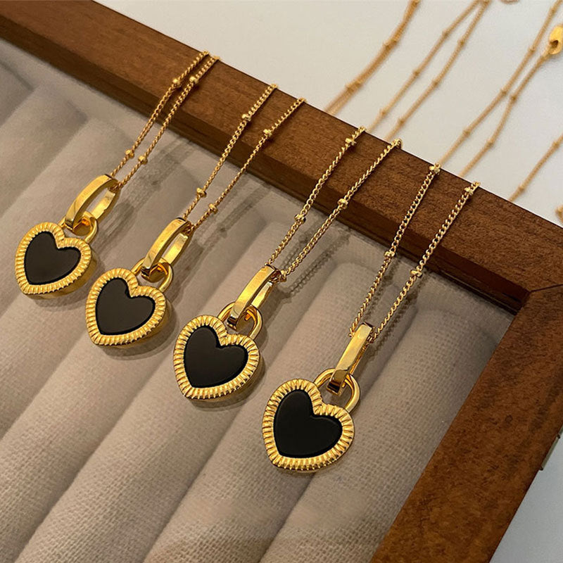 Black and White Heart Pendant Necklace in Gold
