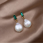 Luxurious Earrings with Pearls and Green Zirconia in Gold