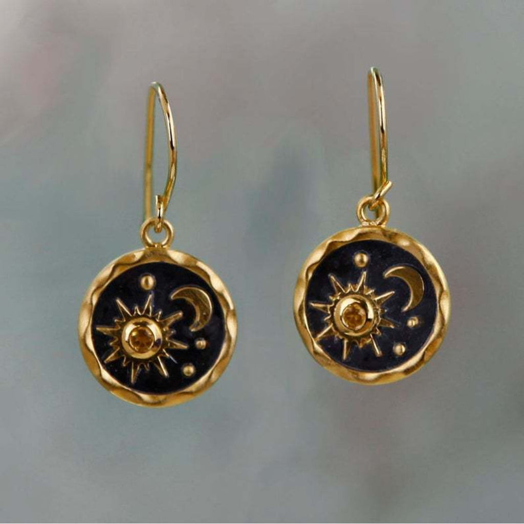 Earrings with sun and moon in gold and silver