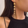 Golden Pearl Dangling Earrings