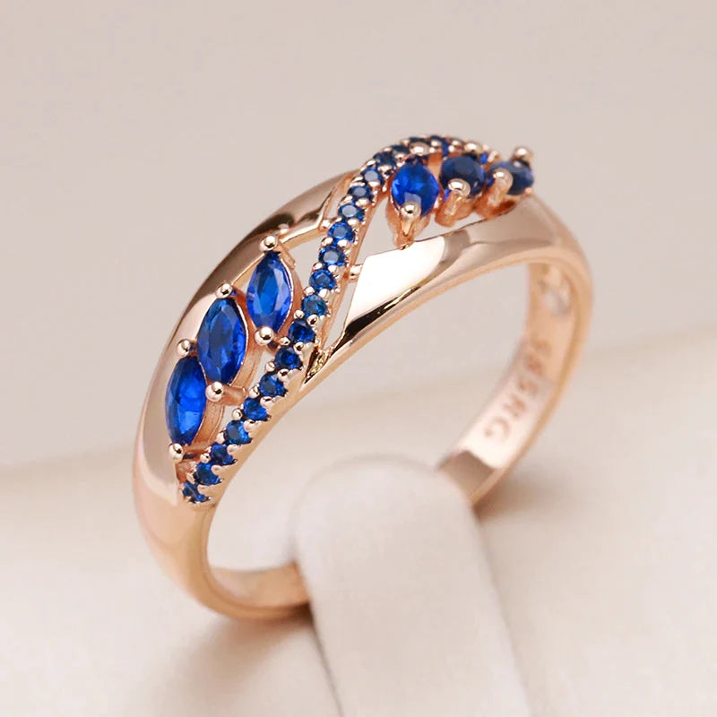 Golden Ring with Blue Crystal