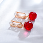 Elegant Red Crystal Ball Earrings in Gold