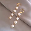 Pearl Dangling Earrings in Gold
